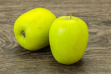 Two ripe green sweet apples
