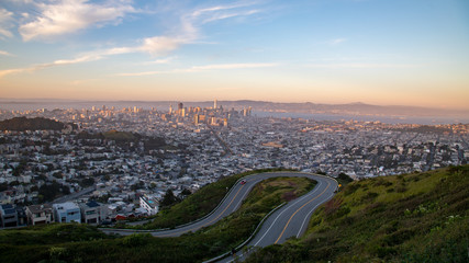 Pink Sky & view of downtown at sunset from Twin Peaks, San Francisco, California - San Francisco City from Twin Peak - Market Street and downtown San Francisco, seen from Twin Peaks