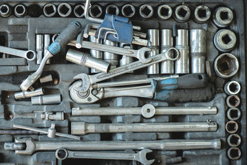 Fototapeta premium Work tools and wrenches in the toolbox flat lay background.