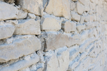 Wall of the old castle made of sandstone.