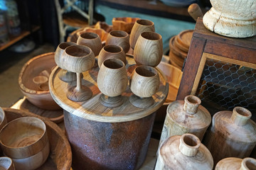 Fototapeta premium Display shelf of wooden handcraft containers