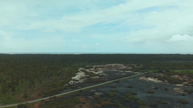 Amazing aerial of the access road running through the great Icacos wetland during a severe drought in the dry season