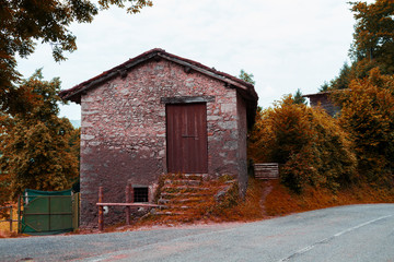 View of a mountain barn in autumn