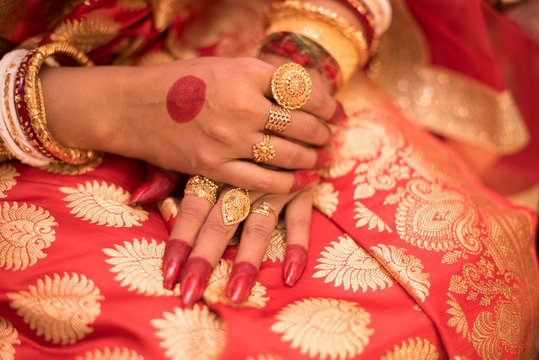 Alta design on hand of girl for hindu Indian wedding ceremony