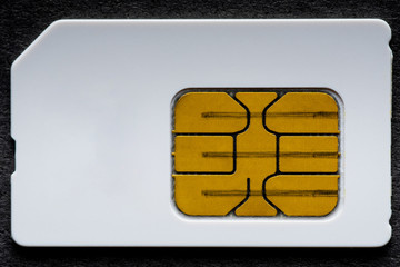 Sim card on a black background.
