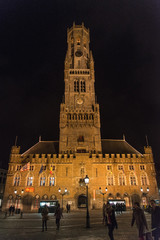 Night scene of Belfry Tower (Belfort) of Bruges. It is medieval bell tower in the historical centre of Bruges, Belgium.