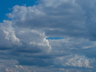 Clouds in the open blue sky