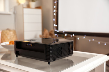 Modern video projector in room