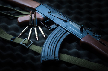 Russia's assault rifle Kalashnikov AK-47 with couple of rounds