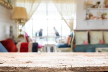 Empty wooden table space platform and blurred resturant or coffee shop background for product display montage