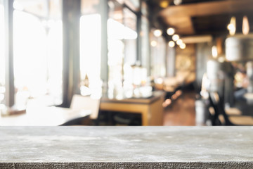 Empty wooden table space platform and blurred resturant or coffee shop background for product display montage