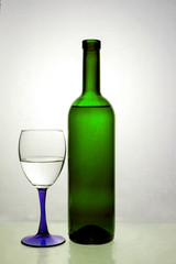 Water is poured into glass glasses standing on glass