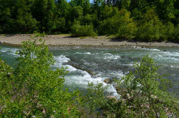 Obraz premium mountain river between sheer cliffs . blue clear water of the river.