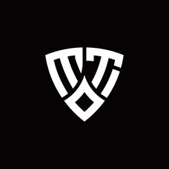 Fototapeta premium MT monogram logo with modern shield style design template