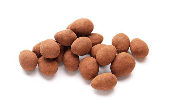 Tasty chocolate nuts on white background