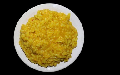 Khichdi Dish in a Plate Isolated on Black Background, Also Known as Khichuri or Khichri