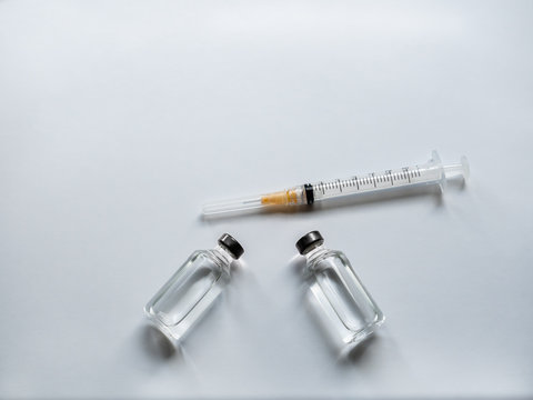 Two Vials And One Syringe