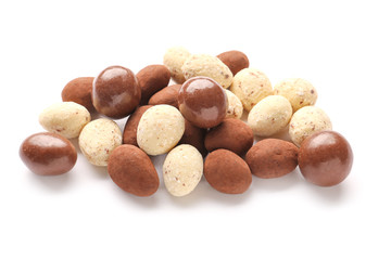 Tasty chocolate nuts on white background