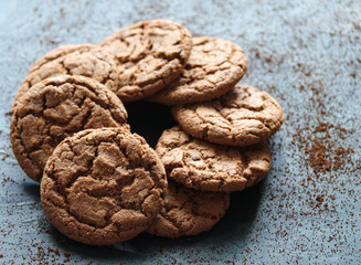 chocolate oatmeal cookies on a black background close up