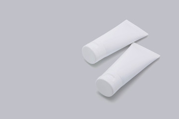 Cosmetic tube isolated on white background, mockup package of lotion or cream, product beauty and makeup, treatment skin care or acne, packaging or container, health and medicine template.