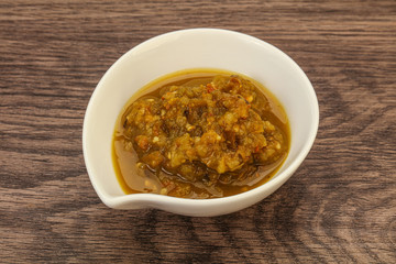 Green spicy sauce in the bowl