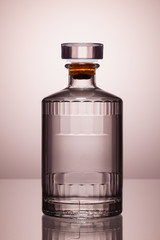White Glass of Gin on the glass table.
