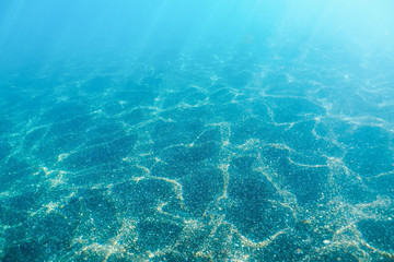 Fototapeta na wymiar Being underwater. Clean sea. Nature on the island Santorini, Cyclades, Greece