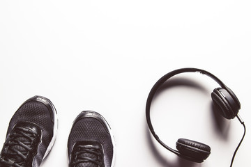 Sport background. White headphones. Copy space for text.