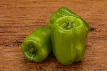 Three green bell juicy peppers