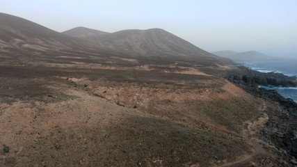 Walking along the coast contemplating the wonders of nature with its mountains,its natural pools and its ocean