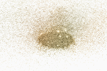 Textured background with golden glitter sparkle on white