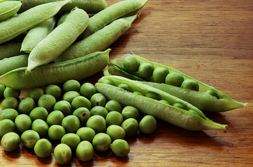 Fresh green peas on the table 