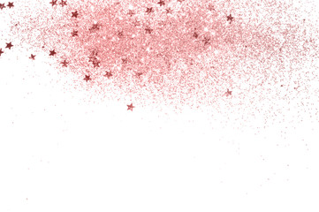 Pink glitter and glittering stars on light gray background