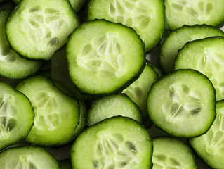 slices of juicy fresh cucumbers macro photo