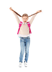 Cute little schoolgirl on white background