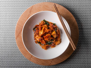 Homemade spicy pork belly cooked with kimchi, spring onions, onion and tofu. Marinated with red chilli paste called gojuchang.