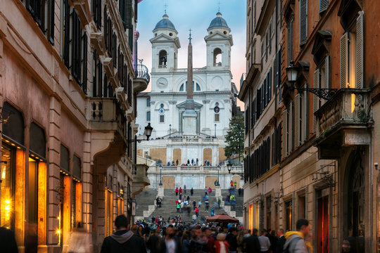 Fototapeta Old cozy street near Spanish Steps in evening in Rome, Italy.  Night cityscape of Rome. 