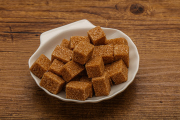 Cane sugar cubs in the bowl