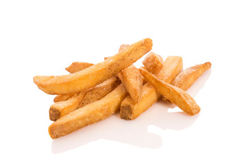 Close-up of homemade french fries with salt isolated on white background with reflection.