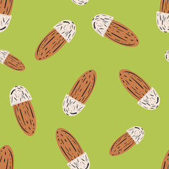 Almond nut vector seamless pattern background. Light brown single oval seeds on loose green backdrop. Kernel shells design. All over print for vegan, nutrition, confectionery, milk alternative concept
