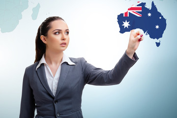 Concept of immigration to Australia with virtual button pressing
