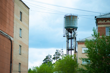 old water tower in the middle of the spring city