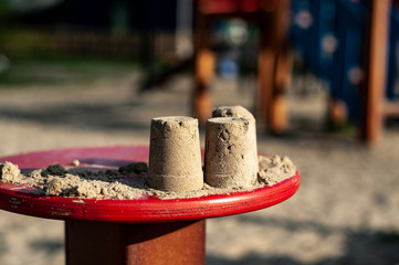 sand turrets, on the playground, on the red column