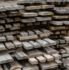 wooden boards stacked on top of each other
