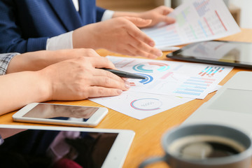 Accountants working in office, closeup