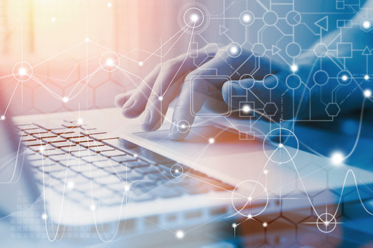 Project management concept. Abstract diagramms and charts on laptop with hand background. Business analytics and financial technologies.