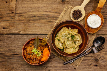 Dumplings stuffed stewed cabbage and sour cream. Traditional Ukrainian dish varenyky