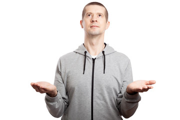 believing male athlete prays for the Islamic, his palms directed towards the sky, the look up, his...