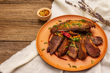 Roasted duck breasts, spices and Demi-glace sauce. Traditional French food