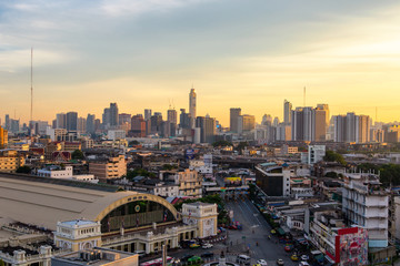 Fototapeta premium Aerial view modern office buildings in Bangkok city downtown with sunrise time